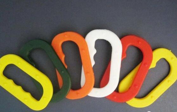 How do you identify the material of plastic parts?